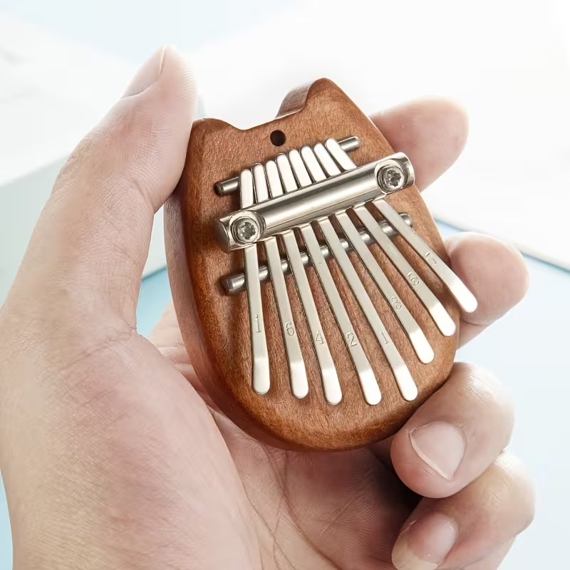 كاليمبا صغيرة ذات 8 مفاتيح (بي - مراجعة Musical Instrument Piano وسعره